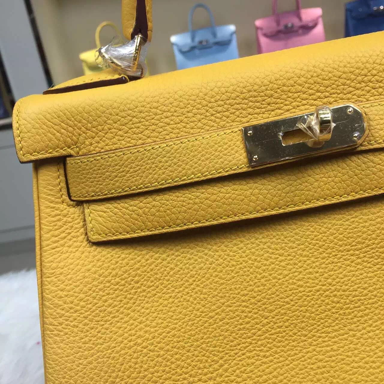 The Hermès 25cm Mustard Yellow Togo Kelly is a handbag from the luxury  brand Hermès – Only Authentics