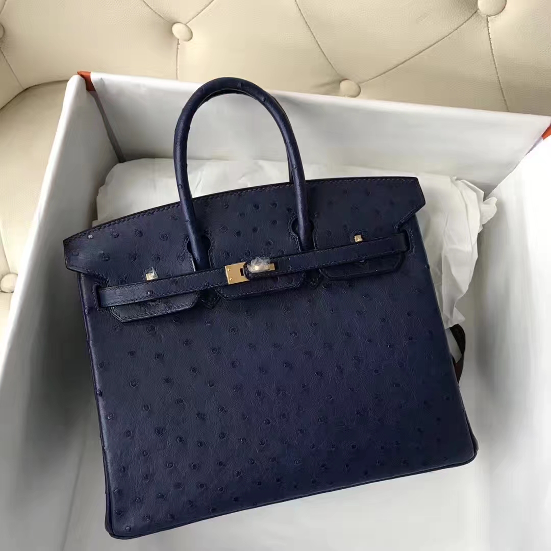A DEEP BLUE OSTRICH LEATHER BIRKIN 25 WITH GOLD HARDWARE